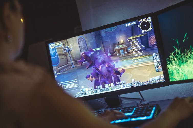 Image of a person playing World of Warcraft.